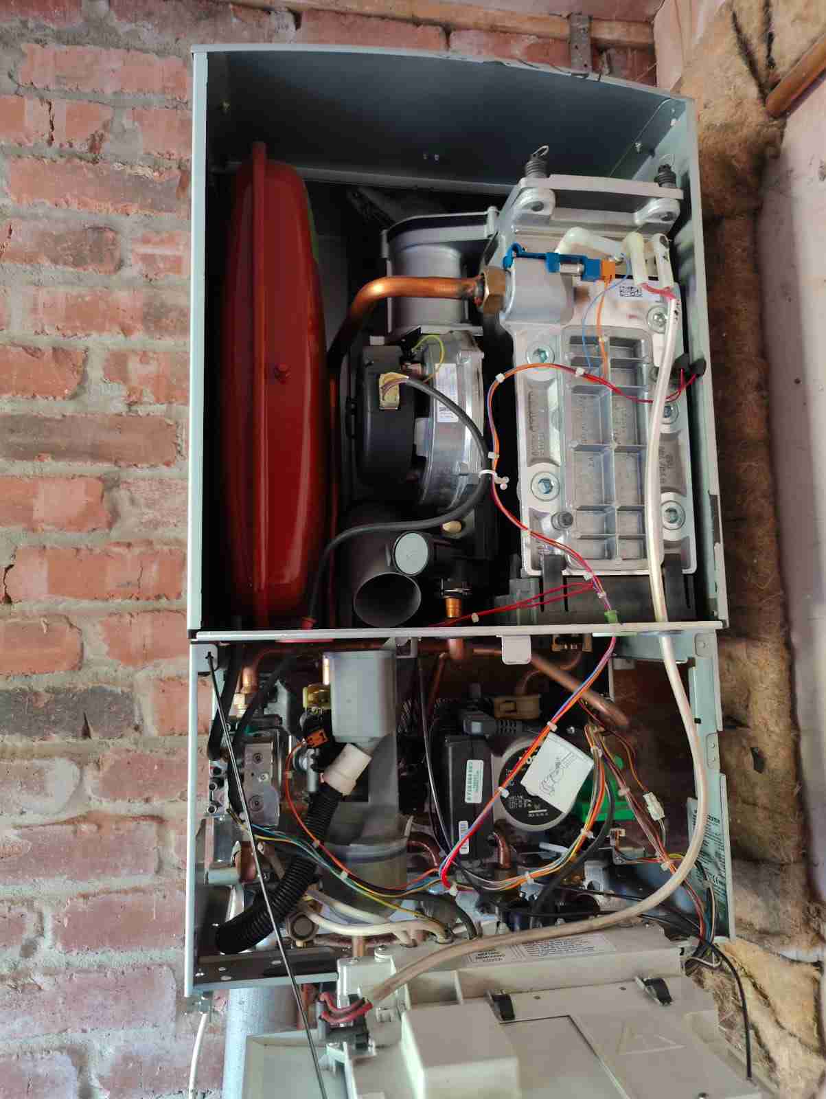 Open boiler casing during inspection by Nebula Plumbing and Heating